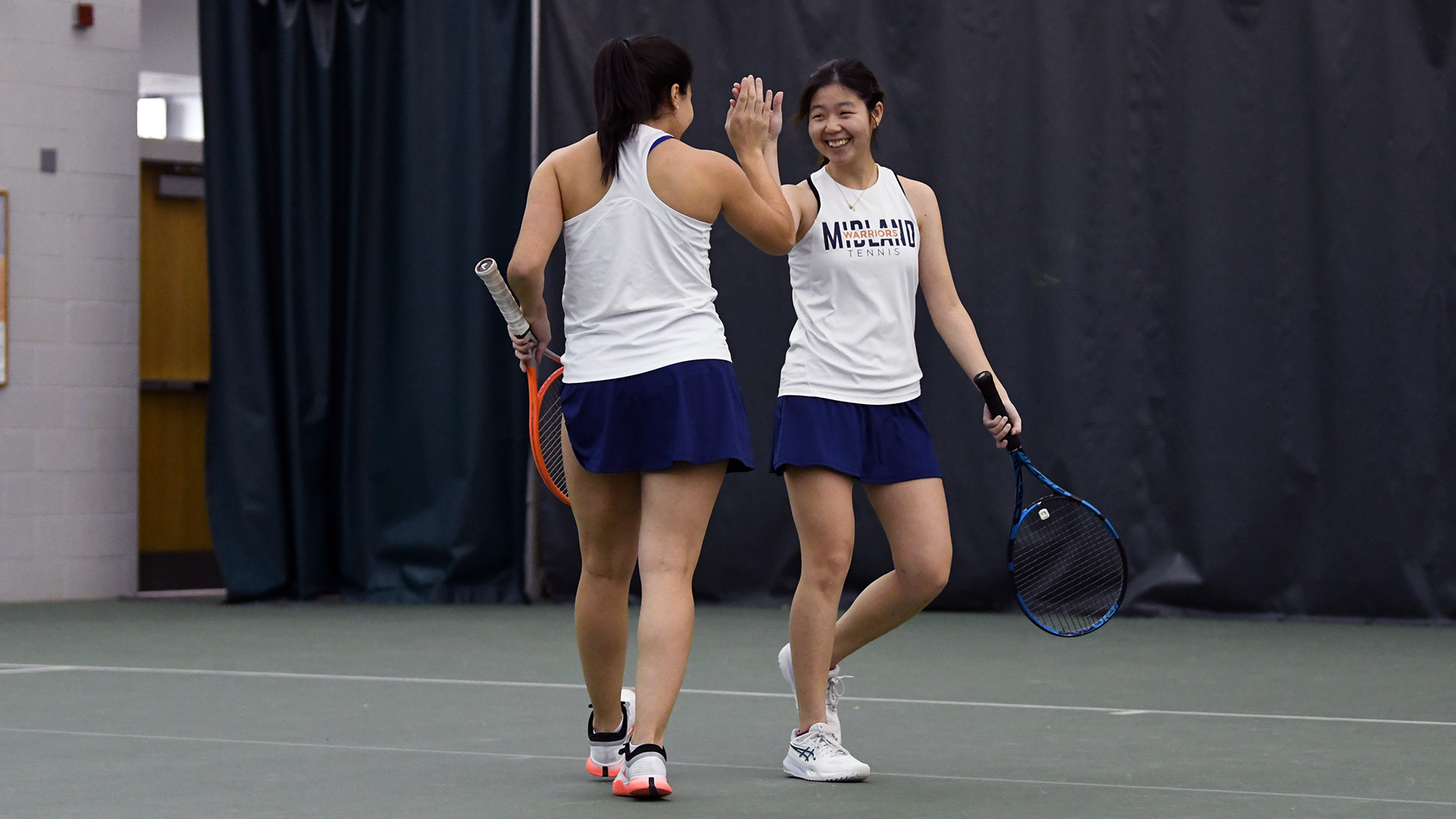Strong Singles Play Lifts Warriors Past Lancers